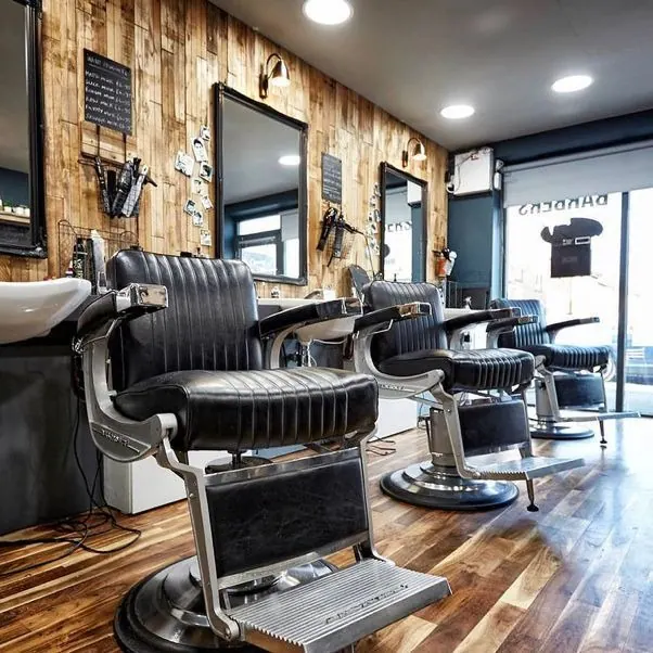 Inside Brooklands Barbershop: the chairs, mirrors and timber walls